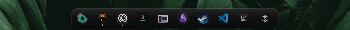 The Ukishima dock: a floating bar of pinned and running application icons at the bottom edge of the screen.